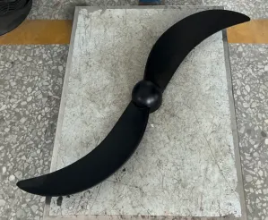 A heavy-duty replacement 2-blade fan propeller designed for high-velocity industrial fans. This robust unit features a unique two-blade aerodynamic design in a matte black finish, engineered to deliver focused and powerful airflow for commercial or warehouse cooling equipment.